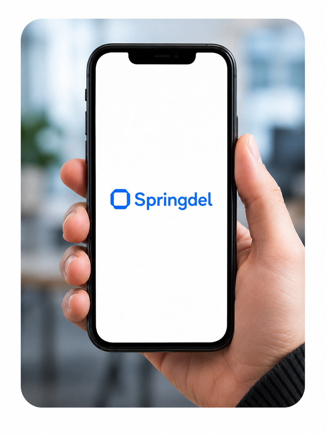 Hand holding a smartphone displaying the Springdel platform